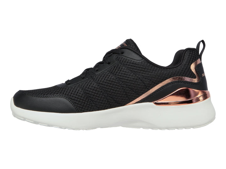 Tenis deportivos Skechers para mujer en color negro con detalles en oro y suela blanca.