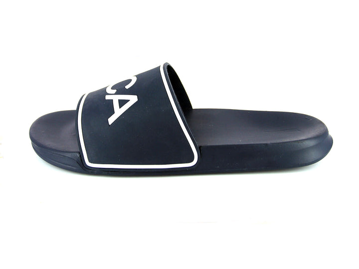 Sandalia tipo slide color azul marino con logotipo blanco de Nautica.