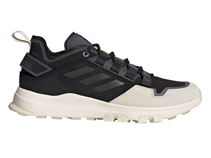 Tenis Adidas Terrex Hikster en color negro y blanco con suela blanca y detalles en gris.