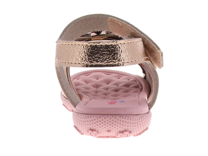 Sandalia para niña color oro rosado metalizado con adorno de moño y suela rosa.