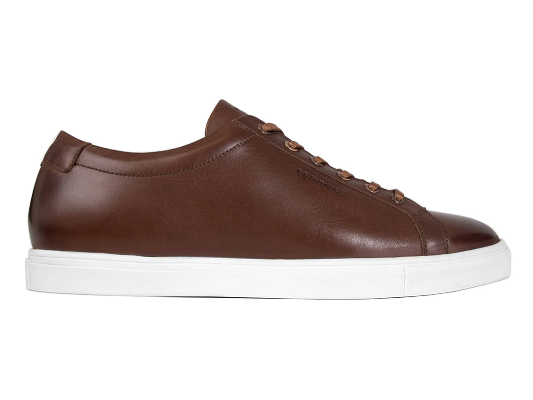 Tenis Brantano Opus para hombre en color café con suela blanca.