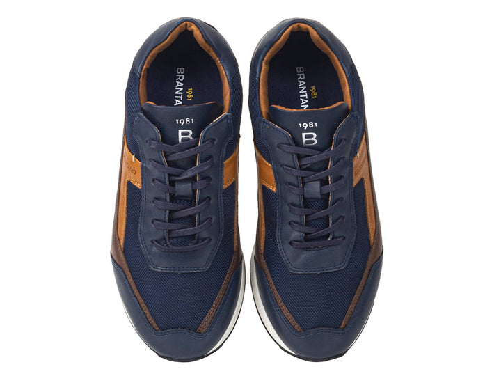 Tenis Brantano Vector para hombre en colores azul y café con suela blanca.
