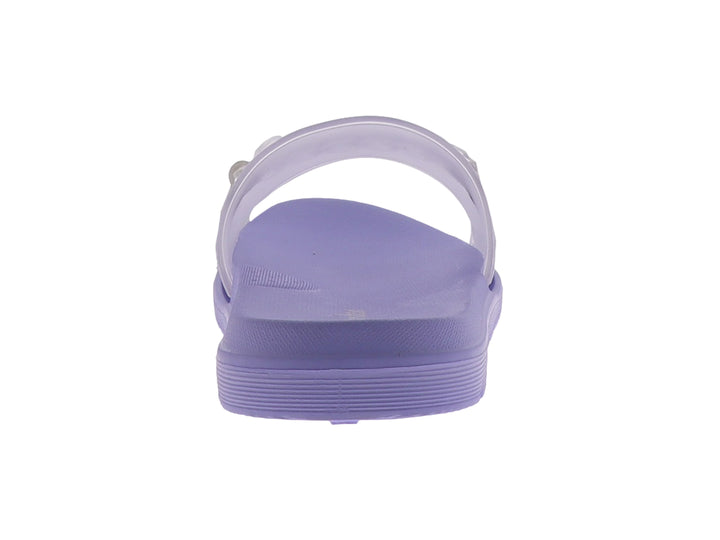 Sandalia color lavanda con tira transparente y detalle de cadena blanca en la parte superior.