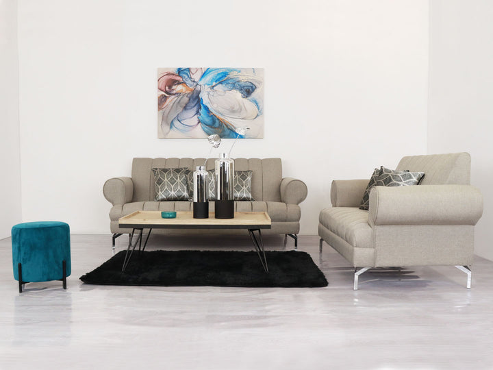 Conjunto de sala modelo Malta Louis en color granito con sofá, loveseat y cojines decorativos.