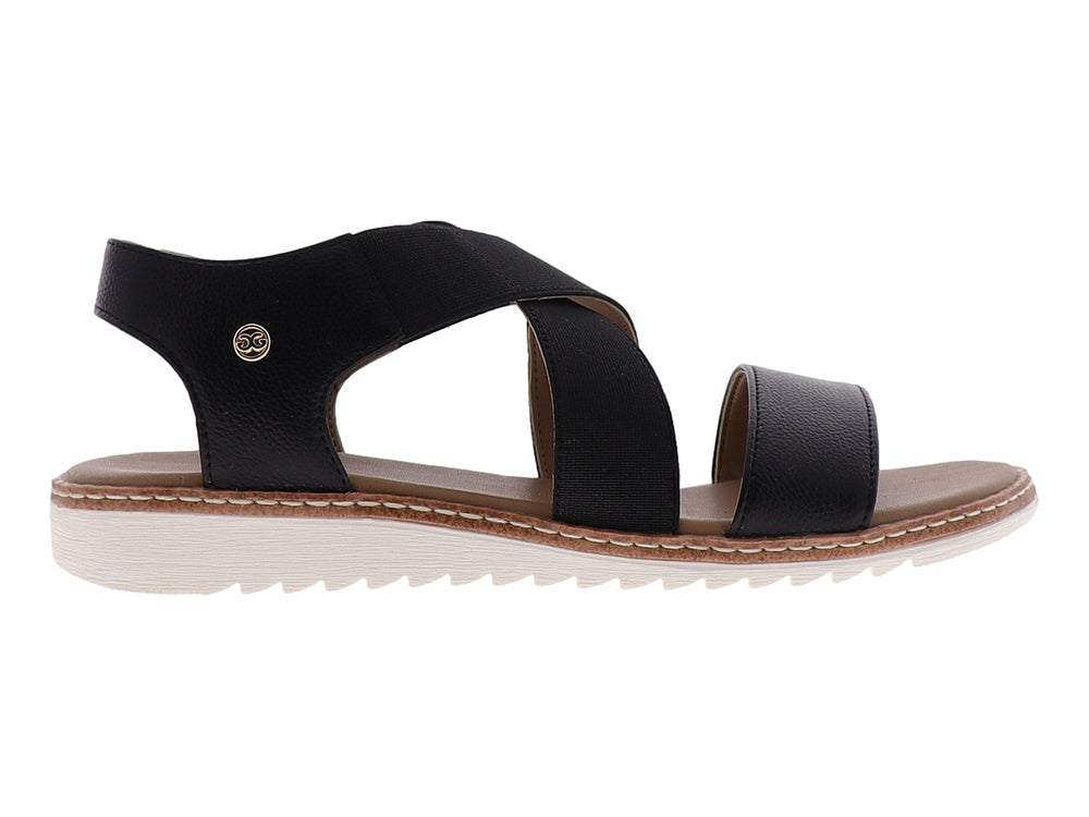 Sandalia casual para mujer de color negro con tiras cruzadas y suela blanca.