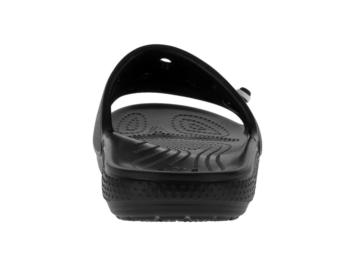 Sandalias Crocs Classic Slide en color negro con perforaciones en la banda superior y logotipo blanco.