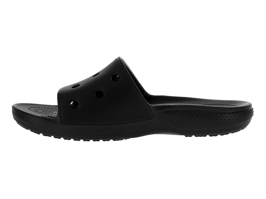 Sandalias Crocs Classic Slide en color negro con perforaciones en la banda superior y logotipo blanco.