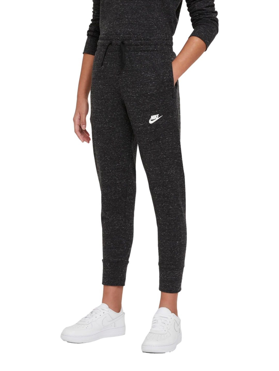 Pantalones deportivos Nike para niña en color negro jaspeado con logotipo blanco.