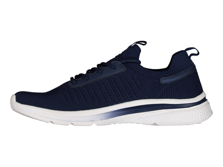 Tenis deportivos Charly color azul marino con suela blanca.