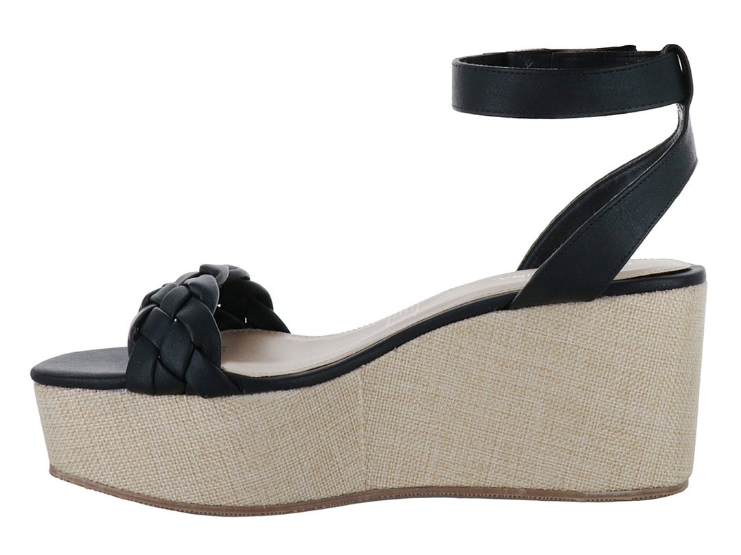 Sandalia negra para mujer con tira trenzada, plataforma beige y correa ajustable al tobillo.