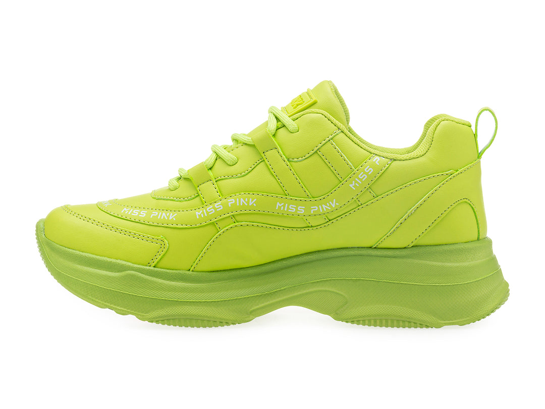 Tenis deportivos color verde neón con suela gruesa y detalles de la marca MISS PINK.