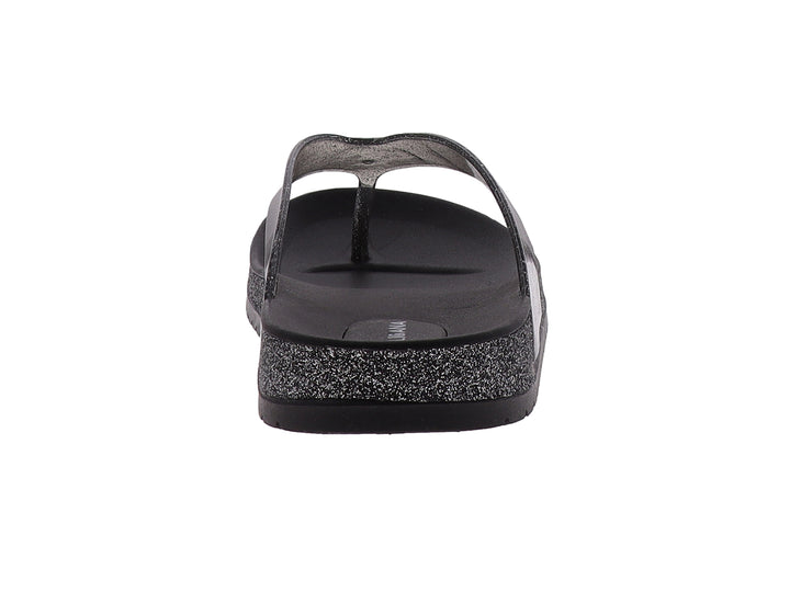 Sandalias negras para mujer con correa transparente y suela con detalles brillantes.