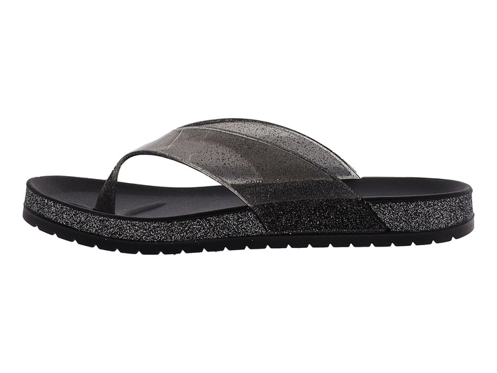 Sandalias negras para mujer con correa transparente y suela con detalles brillantes.