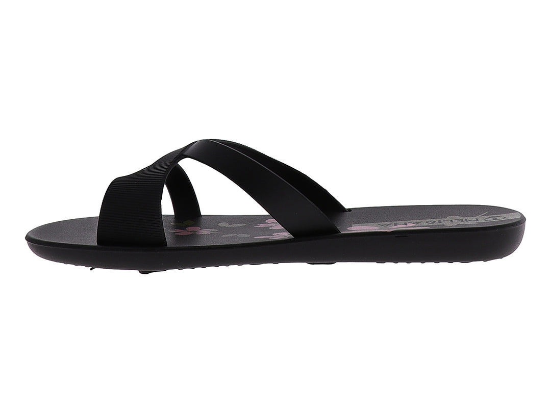 Sandalias negras para mujer con detalles florales en color rosa en la plantilla.