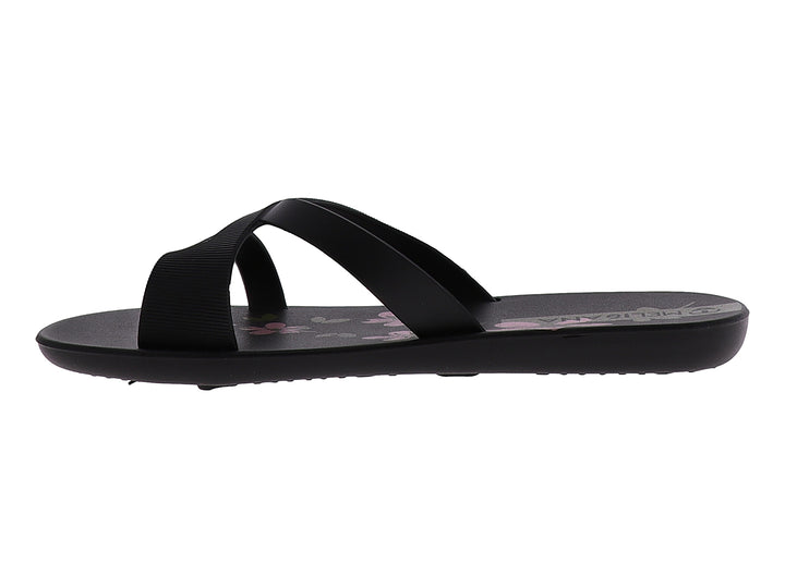 Sandalias negras para mujer con detalles florales en color rosa en la plantilla.