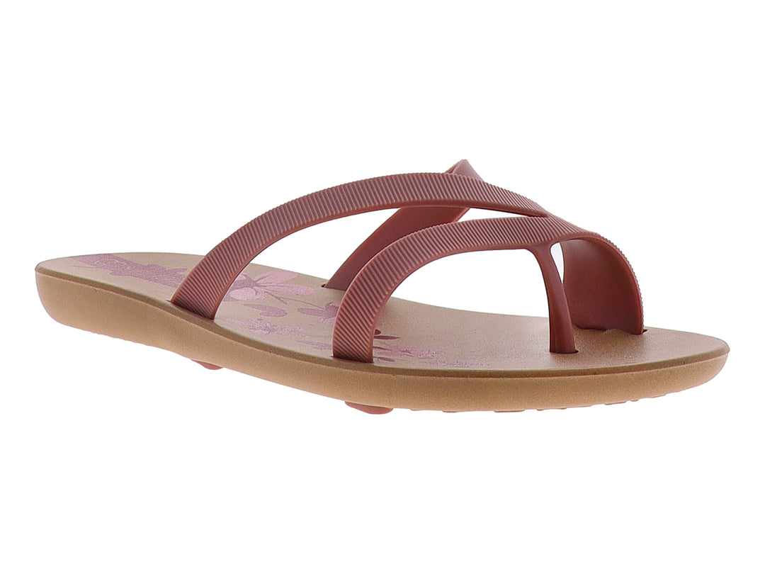Sandalia plana estilo flip-flop en color nude con tiras texturizadas.