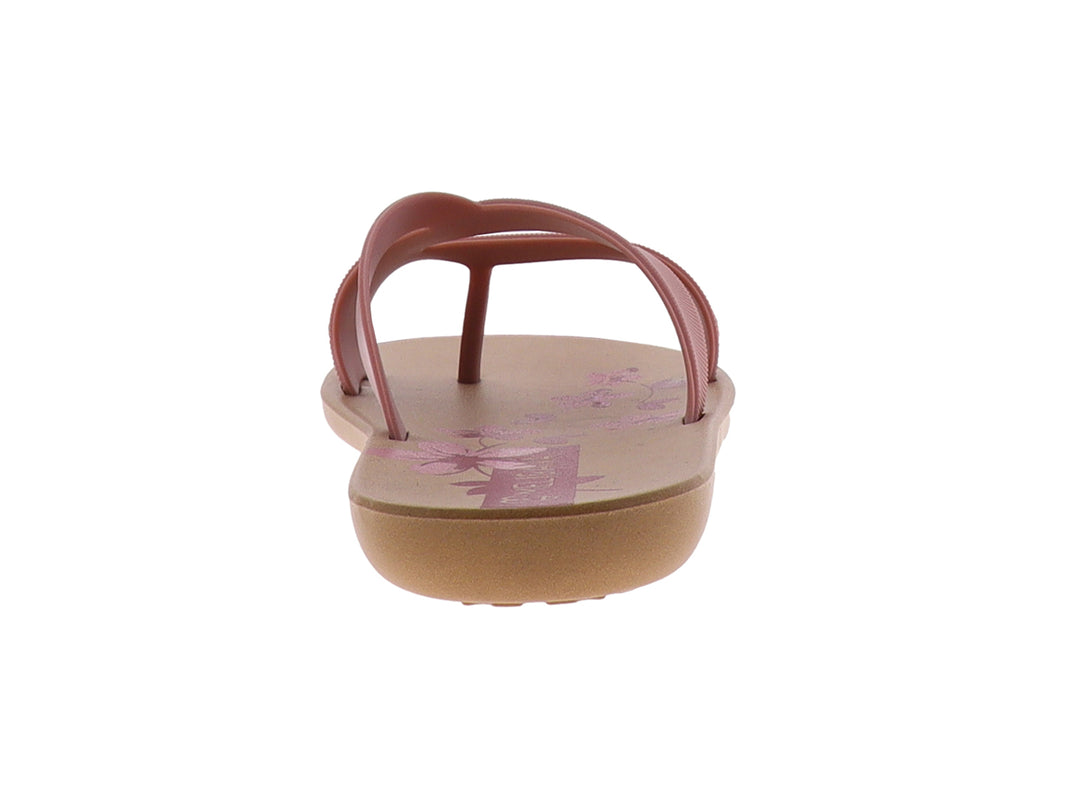 Sandalia plana estilo flip-flop en color nude con tiras texturizadas.