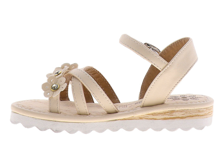 Sandalias color marfil para niña con detalles de flores y cierre de hebilla.