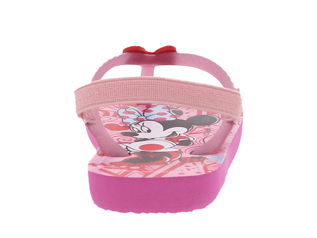 Sandalia rosa para niña con estampado de Minnie Mouse, moño rojo decorativo y correa trasera ajustable.