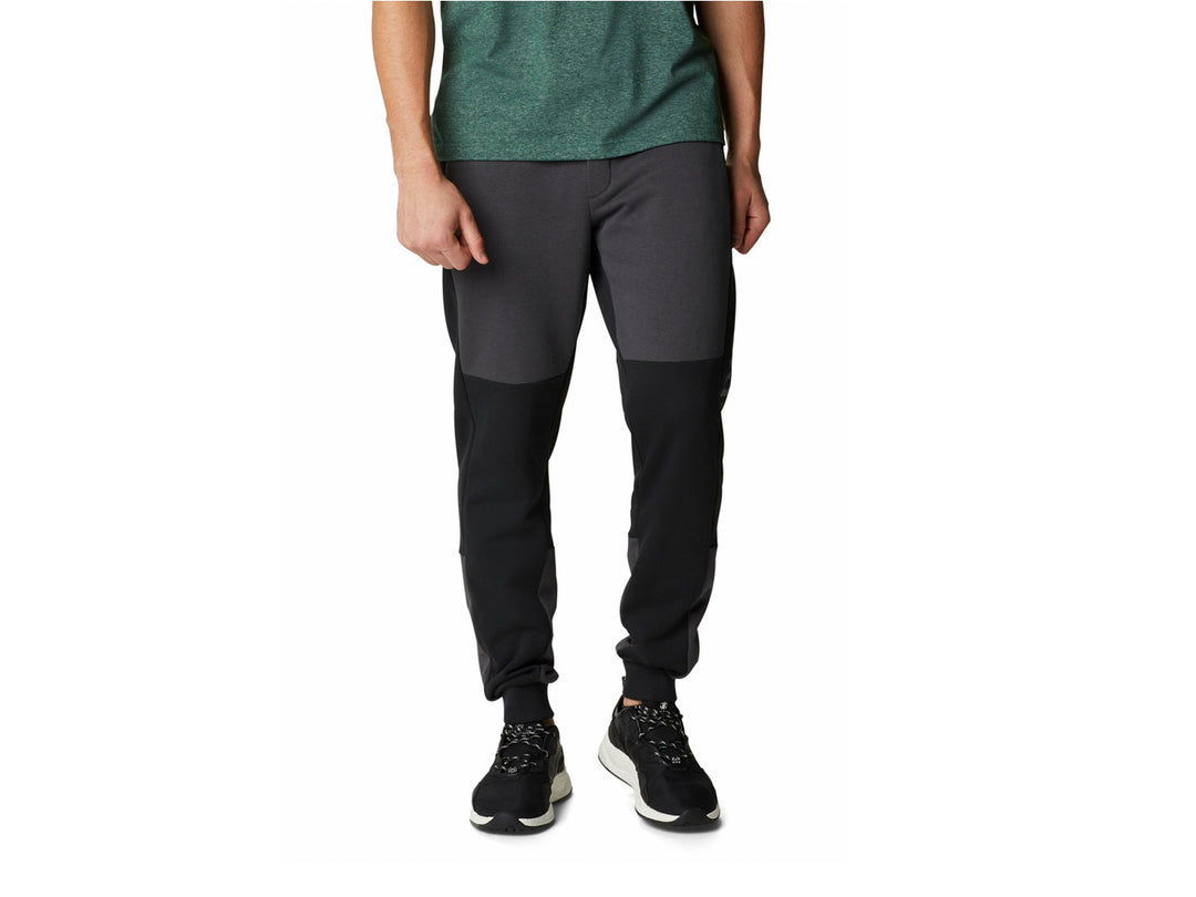 Pantalones deportivos Columbia Lodge Colorblock Jogger en colores negro y gris oscuro.