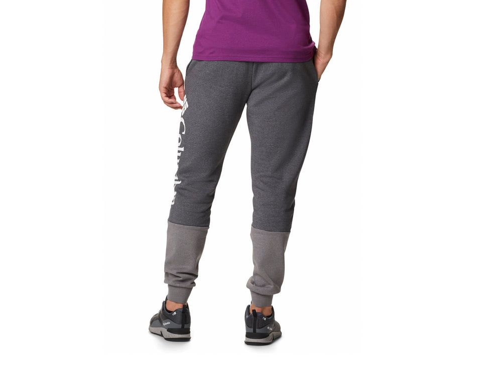 Pantalones jogger Columbia colorblock en tonos gris claro y gris oscuro.