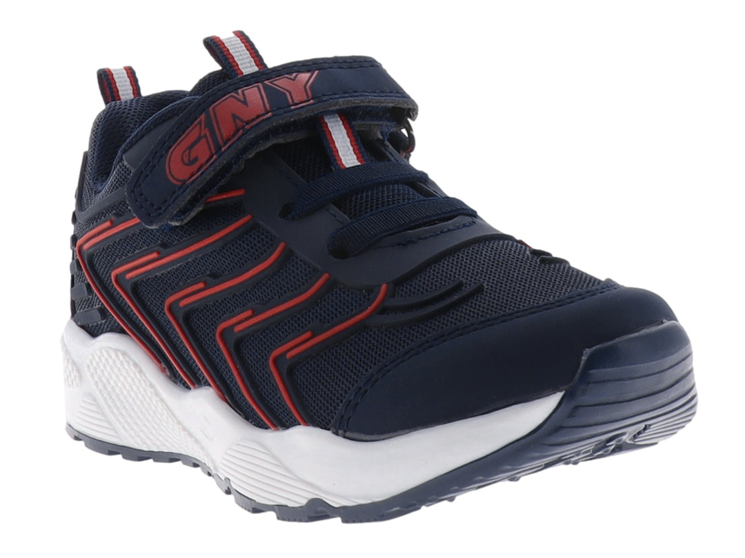 Tenis deportivos para niño en color marino con detalles rojos y suela blanca, cierre de velcro y agujetas.