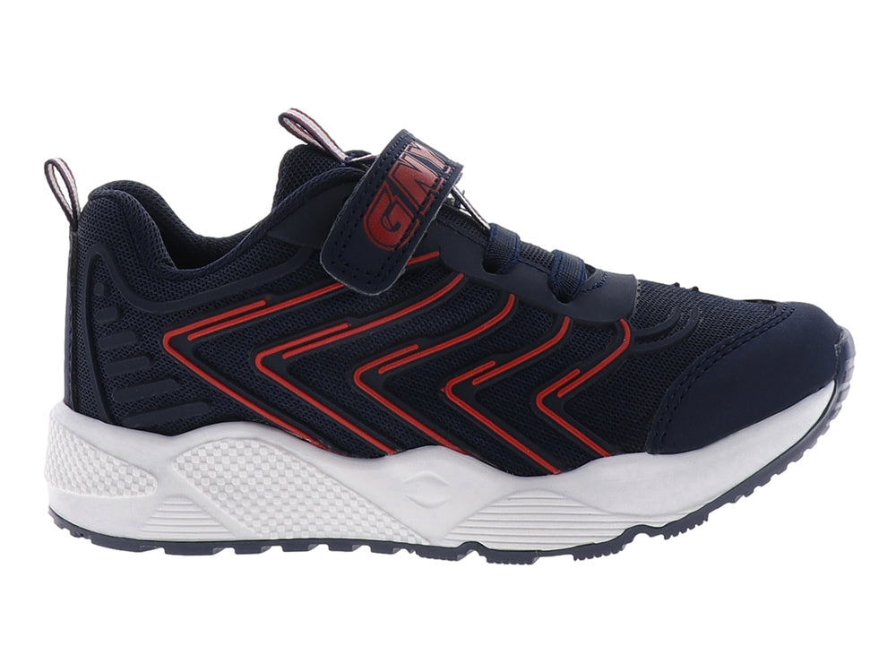 Tenis deportivos para niño en color marino con detalles rojos y suela blanca, cierre de velcro y agujetas.