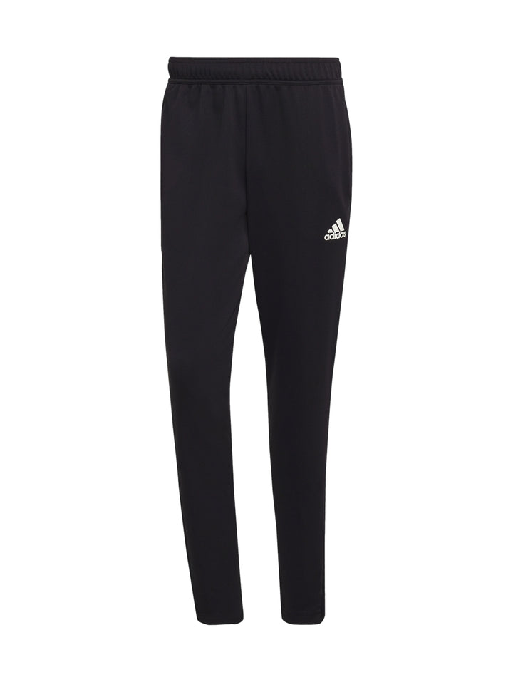 Pantalones deportivos Adidas color negro con tres franjas blancas laterales.