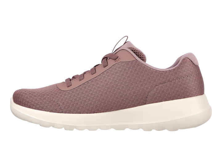Tenis Skechers para mujer en color malva con suela blanca y diseño deportivo de tela.