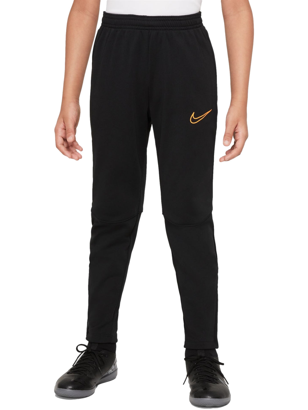 Pantalones deportivos Nike de color negro con logotipo naranja en la pierna izquierda.