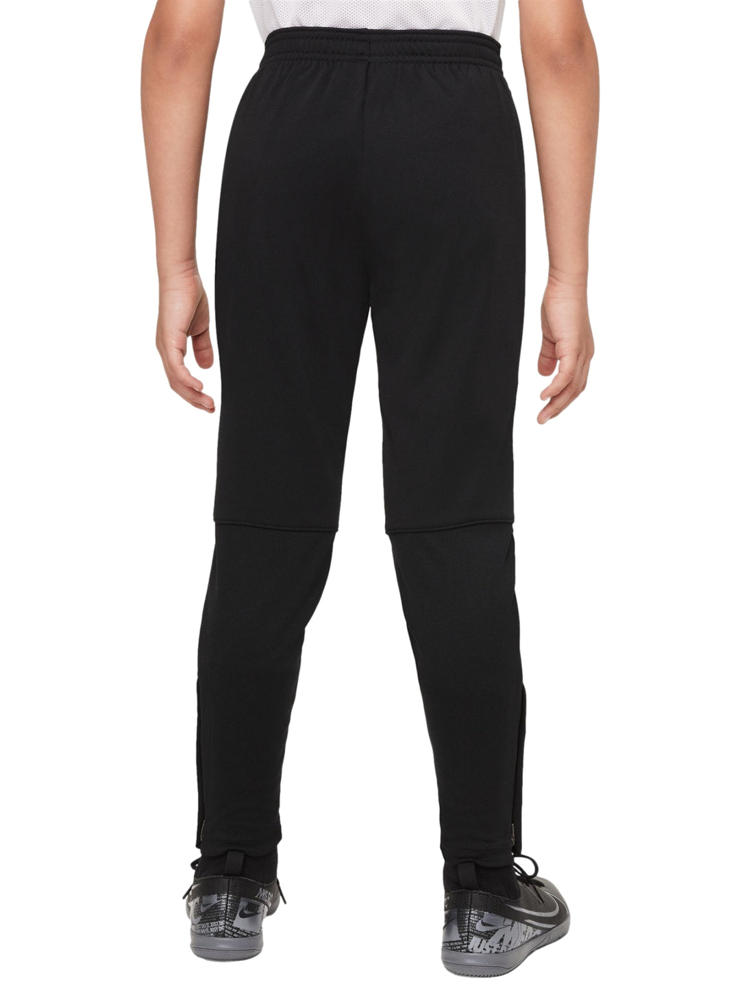 Pantalones deportivos Nike de color negro con logotipo naranja en la pierna izquierda.
