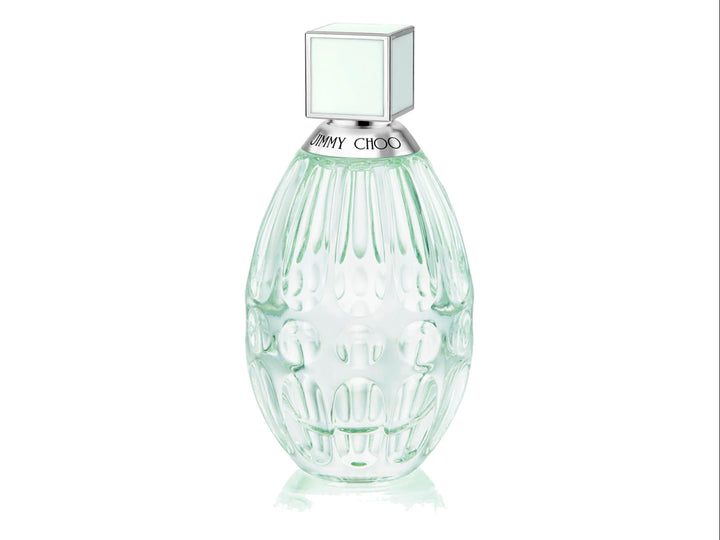 Perfume Jimmy Choo Floral de 90ml Eau de Toilette con su caja blanca y rosa y frasco de vidrio ovalado.