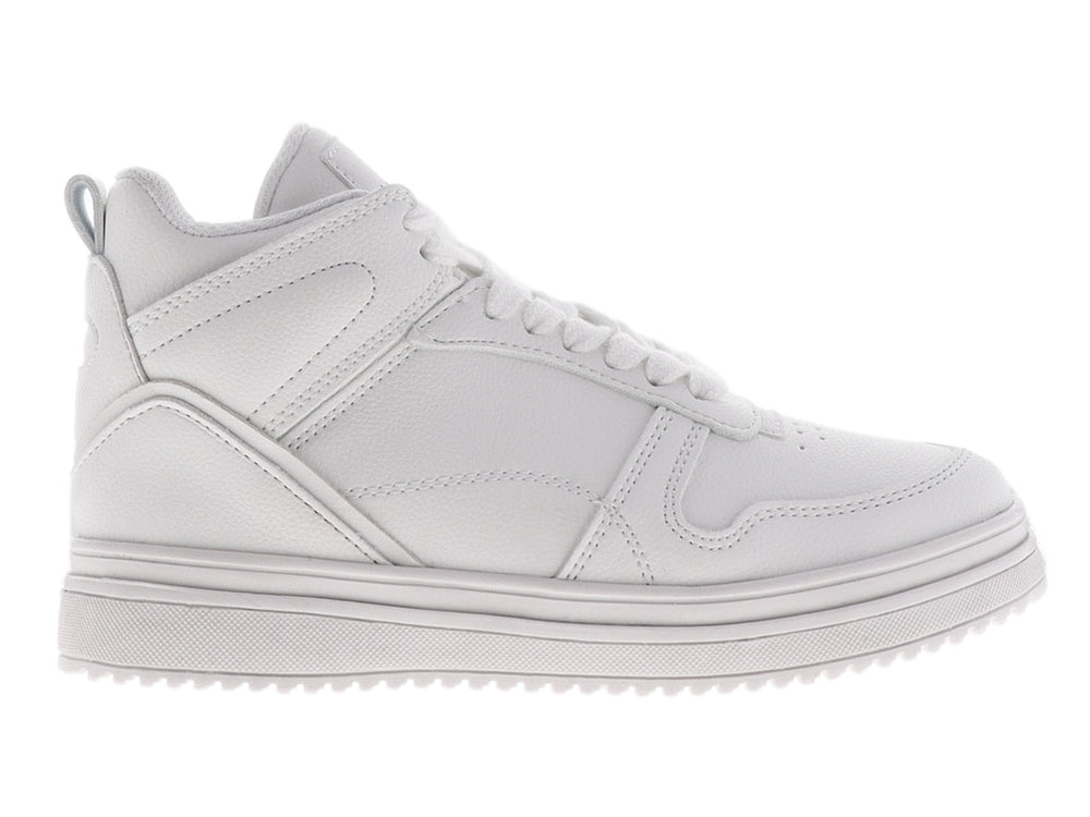 Tenis blancos para niño marca Chabelo con cordones y suela gruesa.