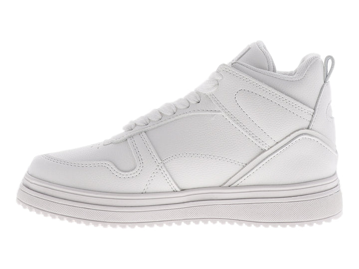 Tenis blancos para niño marca Chabelo con cordones y suela gruesa.
