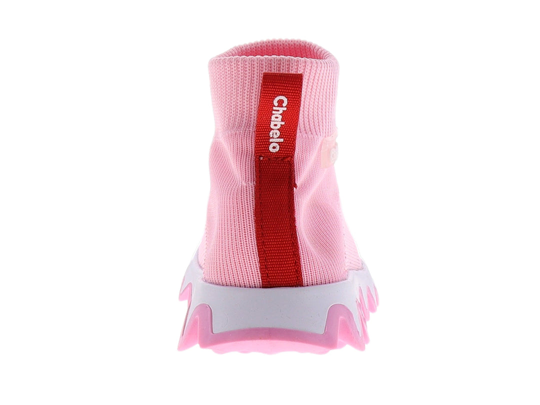 Tenis rosas para niña con tejido elástico y suela blanca dentada.