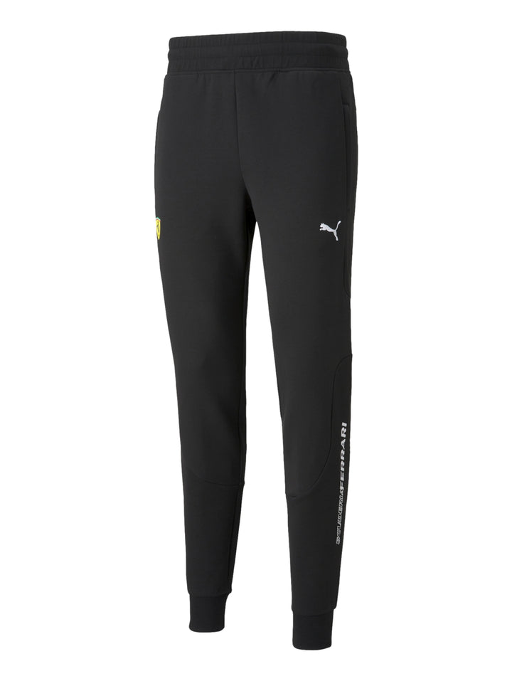 Pantalones deportivos PUMA Ferrari color negro con puños elásticos en los tobillos.