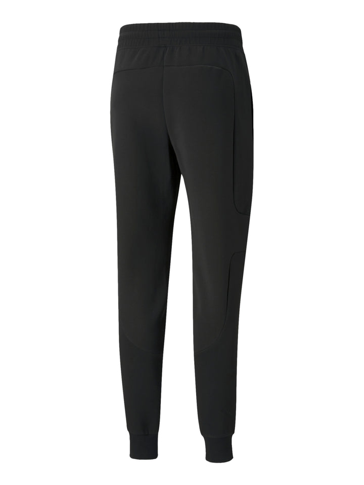 Pantalones deportivos PUMA Ferrari color negro con puños elásticos en los tobillos.