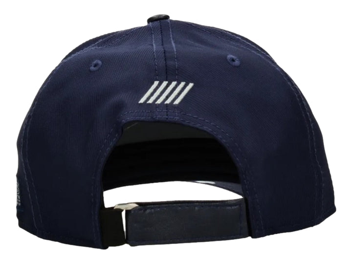 Gorra snapback de color azul marino con logotipo de K-Swiss en el lateral.