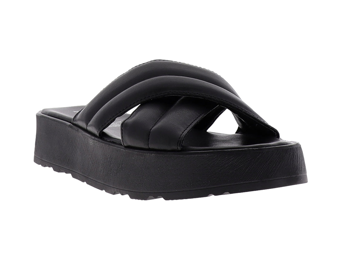 Sandalias negras de plataforma para mujer con tiras anchas cruzadas y suela gruesa mate.