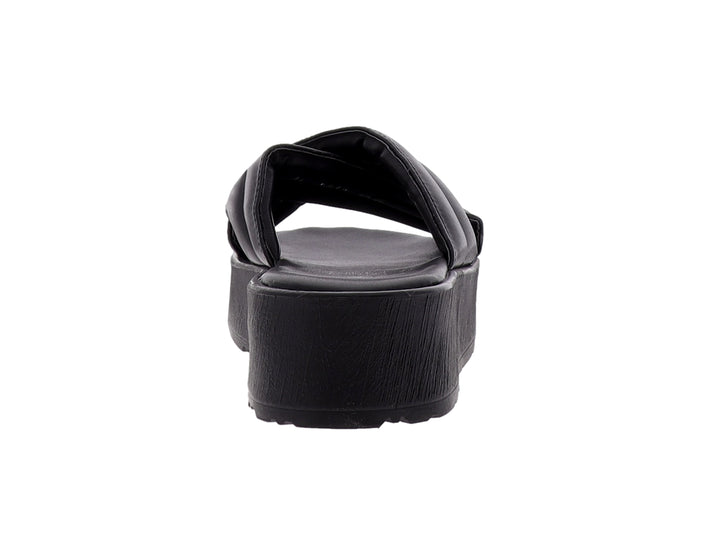 Sandalias negras de plataforma para mujer con tiras anchas cruzadas y suela gruesa mate.