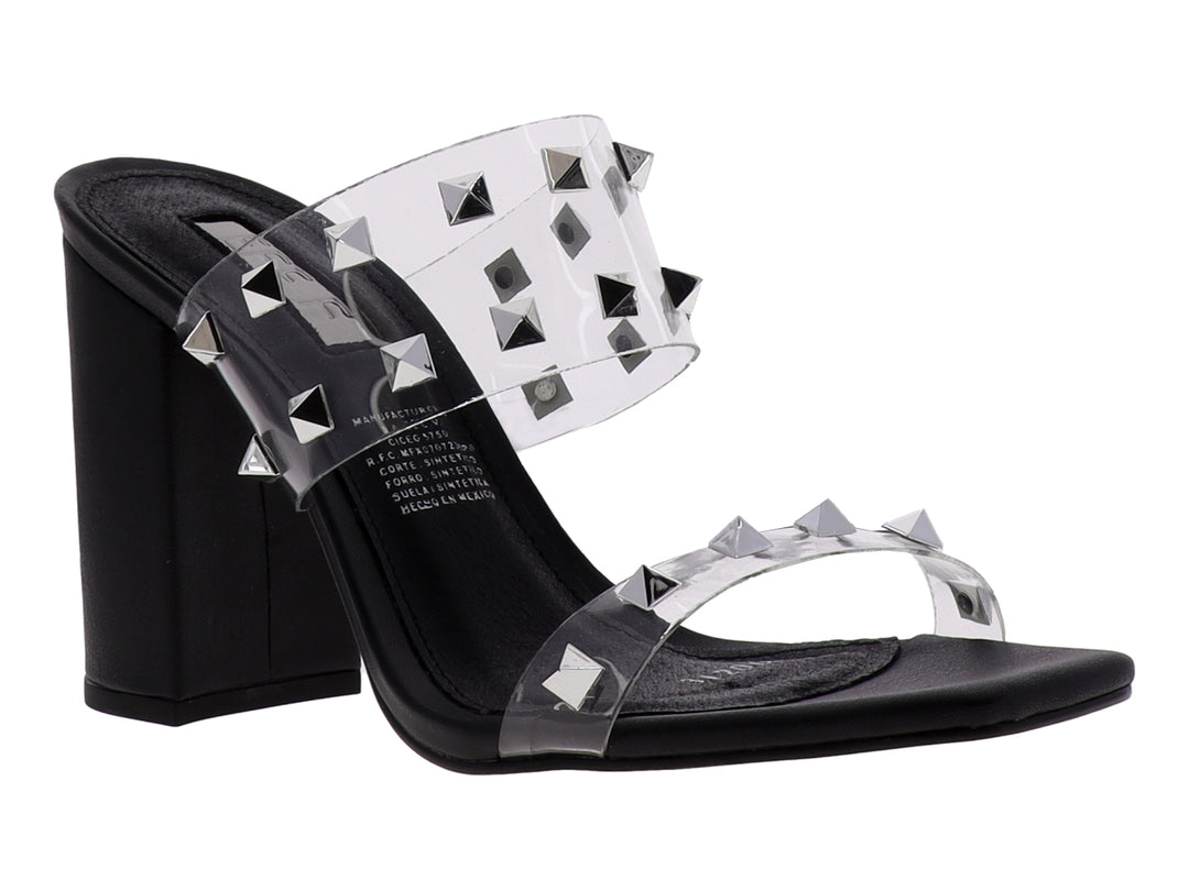 Sandalias para mujer con tacón cuadrado negro y tiras transparentes decoradas con estoperoles plateados.
