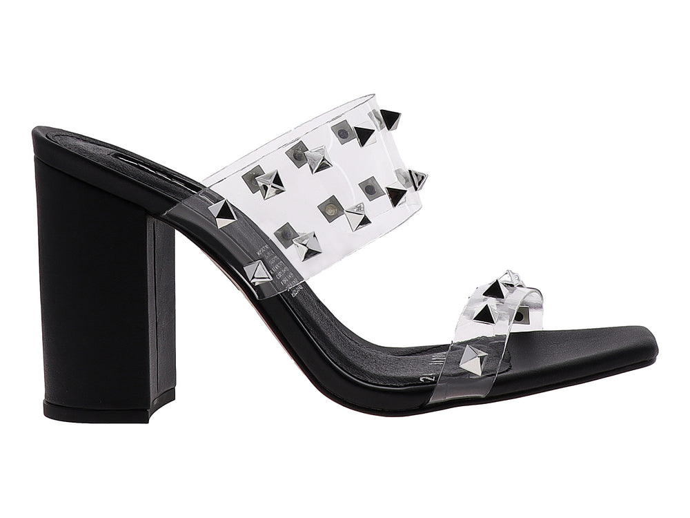 Sandalias para mujer con tacón cuadrado negro y tiras transparentes decoradas con estoperoles plateados.