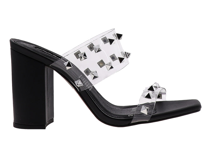 Sandalias para mujer con tacón cuadrado negro y tiras transparentes decoradas con estoperoles plateados.