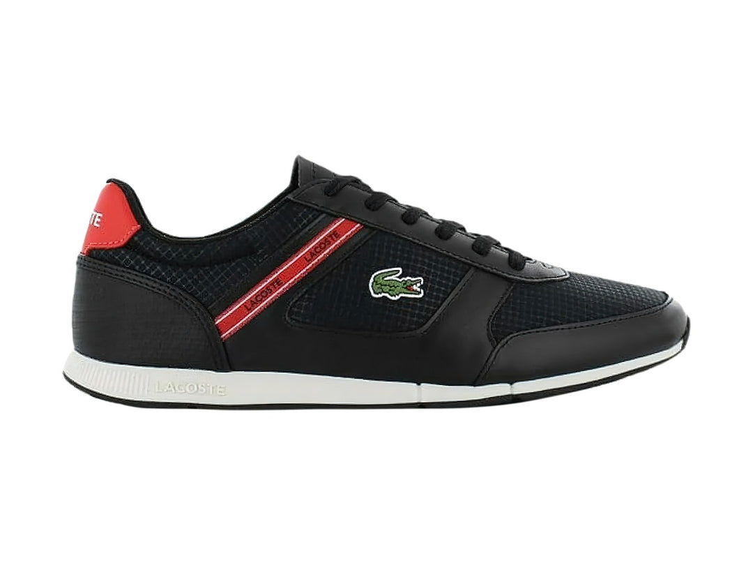 Tenis deportivos Lacoste color negro con franja roja y suela blanca.