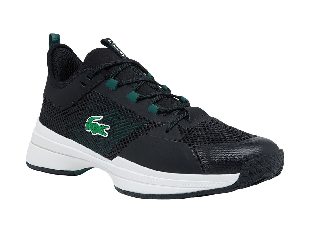 Tenis deportivos Lacoste color negro con suela blanca y logotipo del cocodrilo en verde.