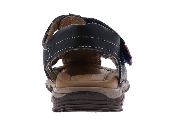 Sandalia infantil azul marino con cordones rojos y suela color café.