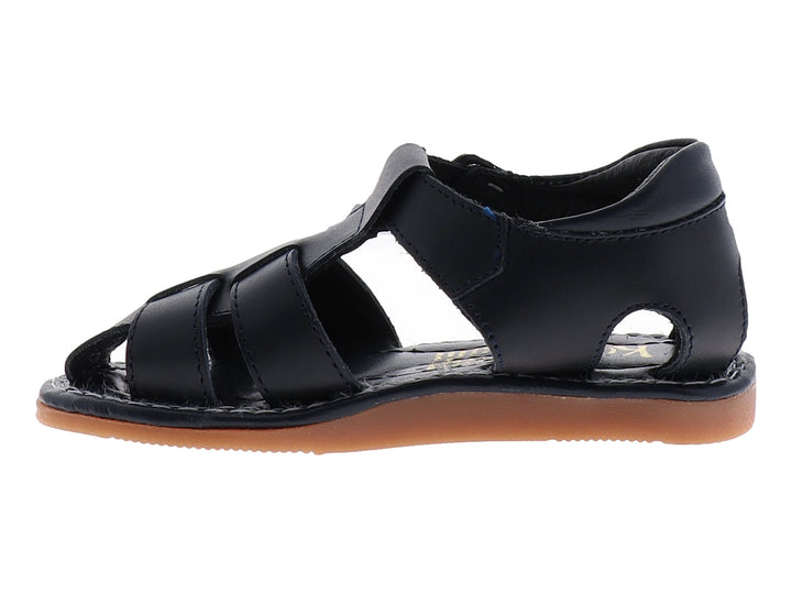 Sandalia infantil de cuero color azul marino con hebilla plateada y suela color café.