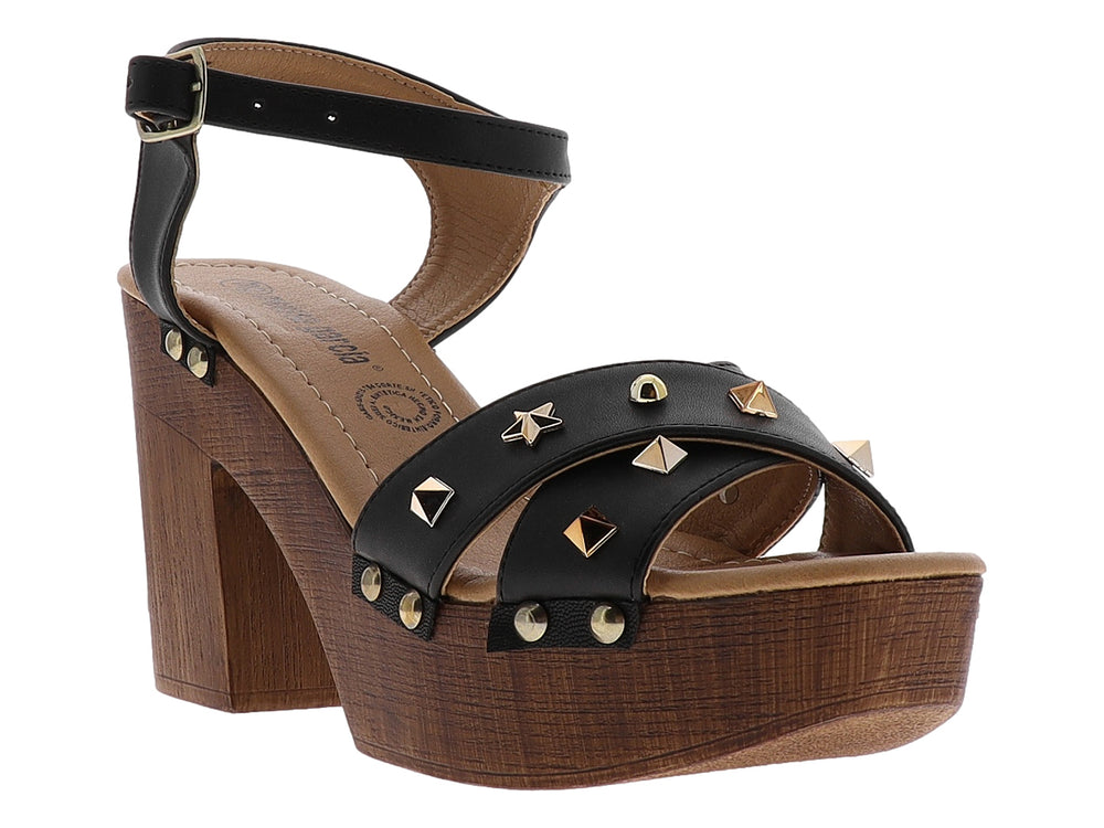 Sandalia negra para mujer con plataforma y tacón marrón, decorada con estrellas doradas y correa al tobillo.