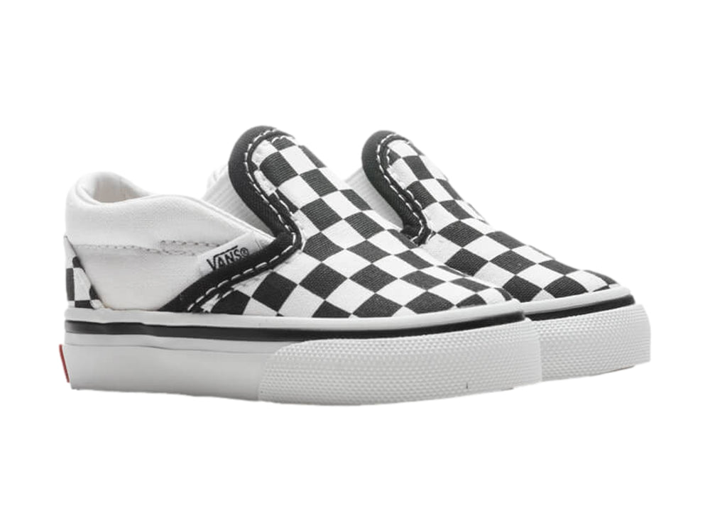 Zapato VANS Classic Slip On para niño con estampado de cuadros blancos y negros y suela blanca.