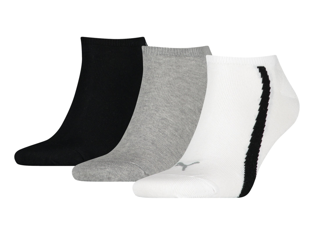 Paquete de tres pares de calcetines PUMA en colores negro, gris y blanco.